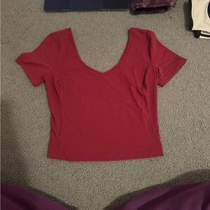 Lululemon Athletica Dark Pink Short Sleeve Fitted Crop Top